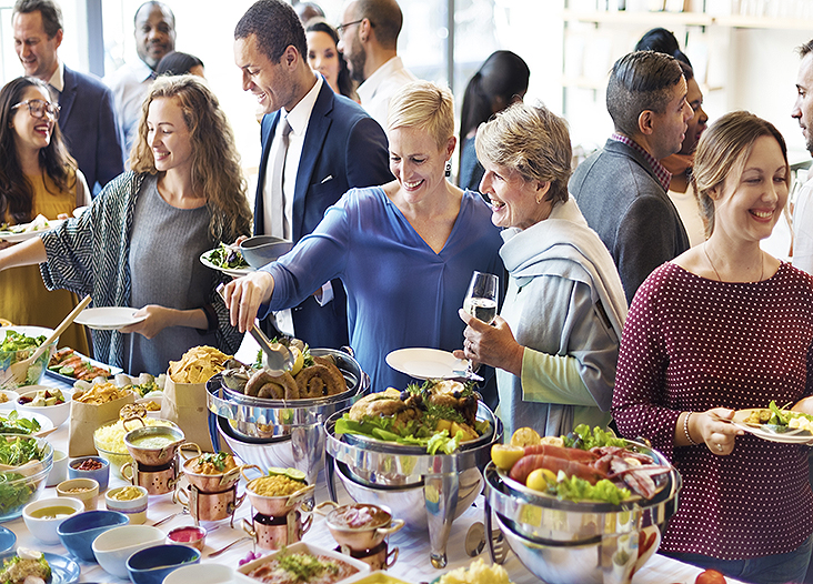 Group of people benefiting from a success cookbook community fundraiser.