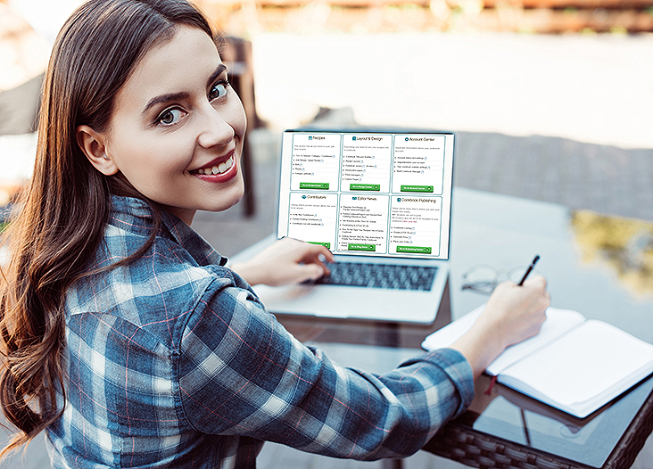 A smiling organizer sitting at a computer, using the CookbookFundraiser.com platform to manage their project. Or A group of organizers and committee members working together on the platform, showing the collaborative aspect.